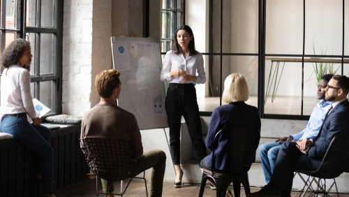 confident-lady-standing in front of whiteboard-IT-Consulting-Waypath