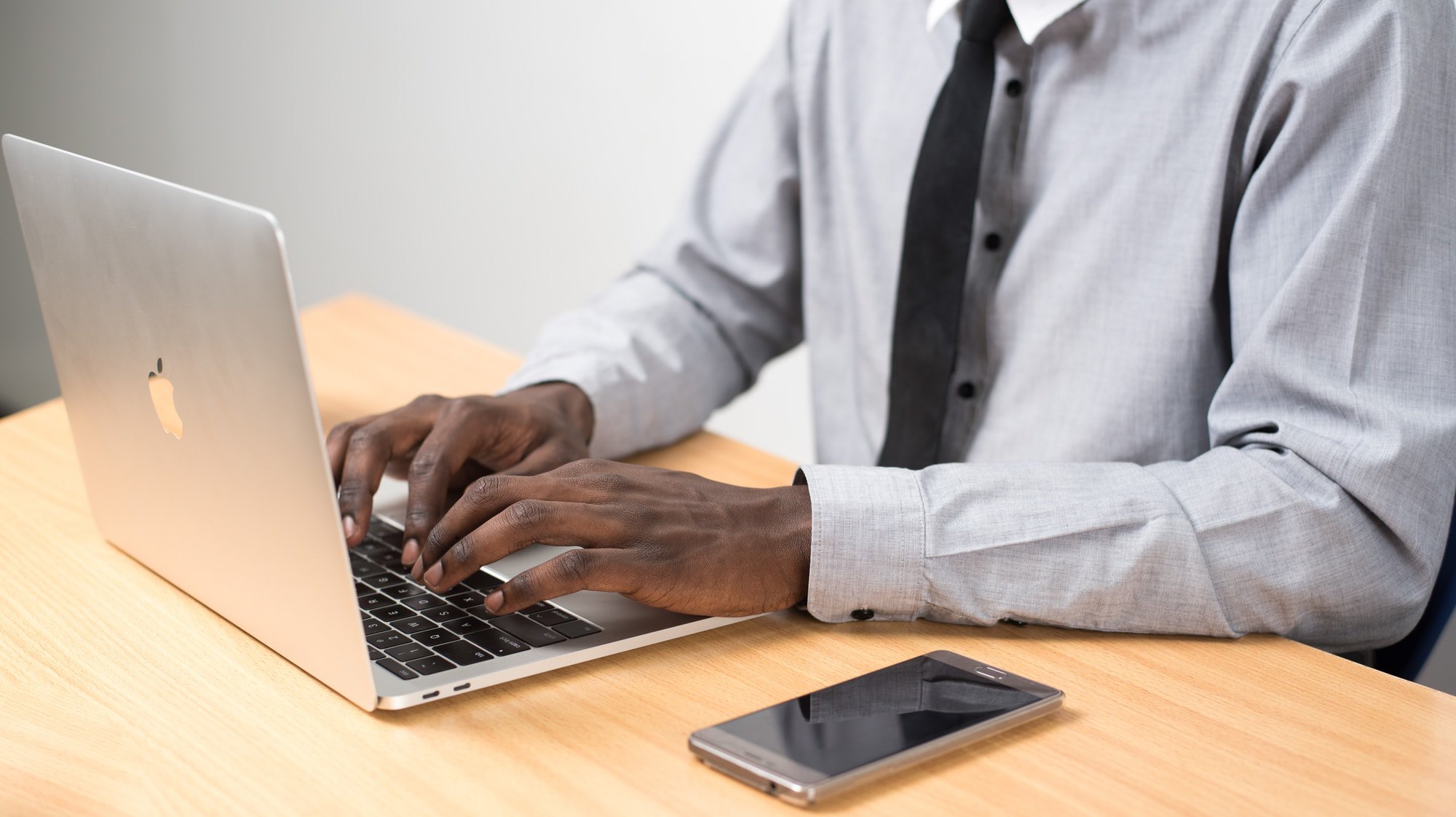 man typing on laptop | WayPath