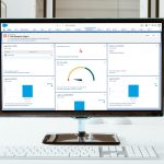 Picture of a computer with Salesforce Adoption Dashboard